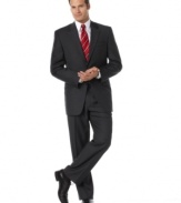 This smartly striped grey suit is handsomely tailored and perfect for the boardroom. Woven high quality wool, it has a fine feel and classic drape. Jacket features a notched lapel, chest welt pocket and front flap pockets. Four-button detail at cuff. Center back vent. Double-reverse pleated pant has quarter-top front pockets for a modern touch. Zip fly with extended-tab closure. Back besom pockets. Unfinished hem. Jacket and pant sold together.