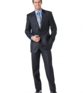 Strike the right balance between classic sophisticated and modern style with this smooth navy suit from Alfani.