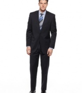 Strike the right balance between classic sophistication and modern style with this slim-fit navy suit from Alfani.