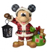 Santa is mousing around! Mickey Mouse makes his way through the naughty & nice list with a bulging bag of toys and an updated red suit. Eccentric detailing, like glimmering checked contrast on his signature ears and a curlicue design, catches the eye.