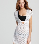 A crochet coverup from Becca® by Rebecca Virtue complements your swimwear with a feminine, body-skimming cut.