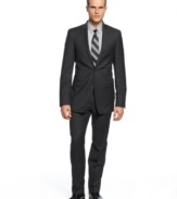 In a sophisticated charcoal plaid and modern slim fit, this Calvin Klein suit was built to last.