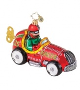 Come in first on Christmas morning when you give the Racin' Roadster ornament, featuring handcrafted glass and glitter detail to brighten the tree and imaginary track. From Christopher Radko.