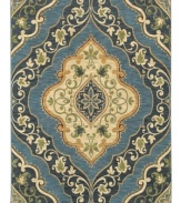 An intricately layered floral and scalloped design creates a striking composition upon this Andora area rug from Shaw Living, reviving lush traditional patterns for the modern floor. Its ultra-durable and supremely soft EverTouch® nylon is meticulously dyed for brilliant color recognition.