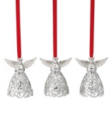 With the words Peace, Hope and Love engraved in their silver filigree skirts, these lovely angels from Lenox remind us what the season's all about.
