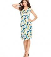 Make a statement in this cheerful dress from Ellen Tracy. A flattering faux wrap silhouette with structured shoulders is enlivened by a bold print.
