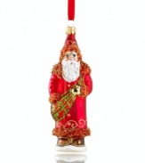 All dressed up and ready to go, this glitzy Santa Claus ornament from Vaillancourt features oodles of sparkle and beading in shades of red, gold and green.