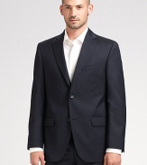 EXCLUSIVELY OURS. An essential look that travels as well as it wears, tailored in sophisticated wool super 120s that never goes out of style. Two-button closure Chest welt, waist flap pockets About 30¼ from shoulder to hem Loro Piana serge wool; dry clean Imported Additional Information Men's Suits Size Guide 