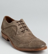 Weathered suede and classic wingtip perforation details complete this beautifully rendered oxford from John Varvatos.