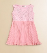 Pretty pleats and delicate lace lend charming appeal to this precious little frock.BoatneckSleevelessPullover stylePleated skirtViscose/SpandexHand washImported
