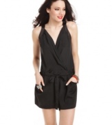 A silky romper that seamlessly transitions into the night, this style from GUESS? is the epitome of sleek-chic! With its wrap-style top and slouchy-cool fit, this one-piece is the ideal mate to a pair of sexy heels!