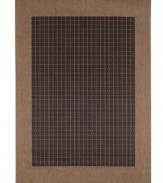 A grid bordered in tasty cocoa tones, this indoor/outdoor rug from Couristan is just what you need to frame a space. Made from fiber-enhanced polypropylene, it's exceptionally durable and 100% recyclable, making it good for (and in) any environment.