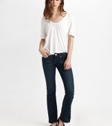 Five-pocket petite bootcut silhouette in clean, crisp denim enhanced with button-flap back pockets with signature stitching.THE FITFitted through hips and thighs Medium rise, about 8 Inseam, about 30THE DETAILSZip fly Five-pocket style Button-flap coin pocket 94% cotton/5% polyester/1% spandex Machine wash Made in USA