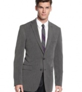 Find the lighter side of business with this sharp slim-fit grey Calvin Klein jacket.