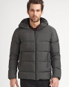 Rich and sophisticated textures elevate this sleek quilted outerwear style featuring an attached hood for added warmth and style.Zip frontStand collarAttached hoodSide zip pocketsAbout 29 from shoulder to hem57% nylon/43% polyesterDry cleanImported