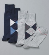 Classic argyle socks from Tommy Hilfiger strike a sophisticated note with any dress shoe.