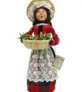 In the business of decking halls with boughs of holly, this festively dressed merchant sells the traditional red and green plants of Christmas. A beautiful figurine from the Cries of London collection, with the handcrafted charm of Byers' Choice.