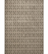 Inspired by early African textiles, the Zanzibar area rug presents a reinvented design in fresh color for the modern home. Its streamlined, low-cut pile and durable construction offer a handsome, lasting finish to any room. (Clearance)