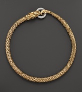 An 18K yellow gold dragon clasps a diamond pavé link in this striking necklace from John Hardy.