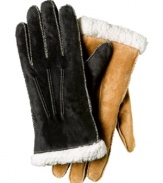 Heavy duty construction and delicate details. Contrast stitching feminizes these thickly-lined suede gloves by Isotoner.