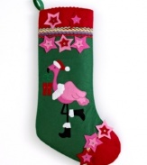 Head south for the winter with a Christmas stocking trimmed in pink stars and flamingos. Embroidered details and colorful ribbons dress up a red and green boot for a bright, sunny holiday.