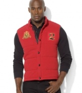 Celebrate your favorite team with this sporty vest, constructed from soft fleece with a protective mockneck and quilted fill for superior warmth and style.