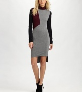 A chunky leather belt lends an edge to this colorblocked jersey design.TurtleneckLong sleevesBelt includedAsymmetrical hemAbout 17½ from natural waist95% rayon/5% spandexHand washMade in USAModel shown is 5'9 (175cm) wearing US size Small. 