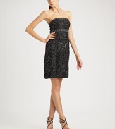 A sophisticated strapless dress with intricate beading and embroidery.Strapless neckline Allover beading and embroidery Empire waist Center rear vent About 21 from natural waist Back zip closure Fully lined Polyester; spot clean Imported Additional Information Women's Premier Designer & Contemporary Size Guide 
