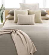 Create a tranquil setting with this Calvin Klein Dash Thorn sham featuring calming hues and woven combed cotton elements.