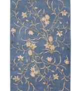 An intriguing vine of flowers bloom against a rich, dark background for a mesmerizing accent to any room. This beautiful area rug is crafted in luxurious premium wool for great texture and magnificent opulence. Hand tufted and hand carved in China and luster-washed for added sheen and years of lasting beauty.
