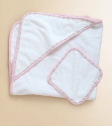 The perfect set for baby's first bath, in snuggly cotton terry edged in floral vine trim.Includes towel and washclothMachine washCottonImported