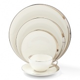 A hand-painted crescent of stunning platinum rims the edges of this thoroughly modern dinnerware collection.