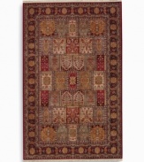 The large size of this rug makes it ideal for great rooms and other open spaces. A striking example of classic Bakhtiyari designs, this rug features organic motifs in a panel design of reds, greens and golds, finished with a rosette border. A special antique wash enhances and harmonizes the burnished colors to create a rich vintage finish. Woven in the USA of luxuriously soft premium worsted New Zealand wool.