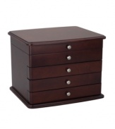 A treasure in itself, the elegant Sophia jewelry chest boasts a hand-rubbed mahogany finish with brushed nickel knobs and velvet lining. Three drawers hold earrings, bracelets and pendants while a catch-shelf lid organizes more-likely-to-tangle necklaces and chains.