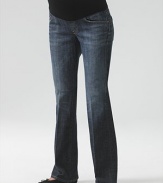 Stretch cotton five-pocket jeans have a comfy elastic waistband to take you through all nine months in style.THE FITStretchy panel at waist Standard bootcut proportion Front rise, about 12 Back rise, about 14 Inseam, about 34THE DETAILSFaux fly Rivet detail Faded down center legs Signature stitching on back pockets Distressed Pacific Ocean wash Nylon/spandex belly panelCotton/polyurethane denim Machine wash Made in USA 