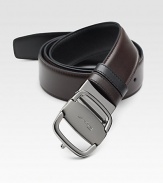 Sleek reversible design rendered in Italian leather, finished with an adjustable signature vara buckle.CalfskinRuthenium buckleAbout 1½ wideMade in Italy