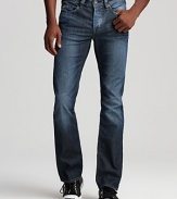 A slim cut lends urban appeal to these distressed jeans from Buffalo.