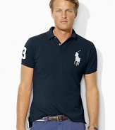 Designed with a trim cut through the body and a shorter hem, this short-sleeved polo shirt is crafted from breathable cotton mesh with Ralph Lauren's Big Pony.