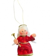 Filled with merriment, the Christmas Delights angel boasts a red dress with gold accessories and the unmistakable style of Annalee ornaments.