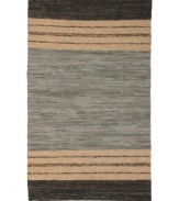Olé! Spice up your decor with the gorgeously festive style of the Matador rug from St. Croix. Durable leather strips in elegant grey and cream hues are meticulously hand woven with fine cotton strands, resulting in a beautiful, rustic texture and natural braided pattern that accents even the most eclectic decor.