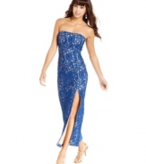 A thigh-high slit adds sweetly seductive style to a fitted, ankle-grazing lace dress underlaid in a sexy nude tone. From Teeze Me.