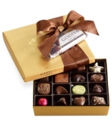 Enticingly wrapped with a satin chocolate bow, this limited-edition collection of classic chocolates from Godiva is made even more delectable when topped with a complimentary dark chocolate souffle dessert truffle bar!