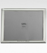 Classic and sophisticated in groove-trimmed sterling silver. Fits 8 X 10 photo Made in SpainFOR PERSONALIZATIONSelect a quantity, then scroll down and click on PERSONALIZE & ADD TO BAG to choose and preview your monogramming options. Please allow 2 weeks for delivery.