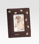 Handcrafted of French goatskin with a golden trail of paw prints, it's an ideal display for the four-legged love of your life. Holds 2¾ X 3¾ photo Made in USAFOR PERSONALIZATIONSelect a color and quantity, then scroll down and click on PERSONALIZE & ADD TO BAG to choose and preview your monogramming options. Please allow 1 week for delivery.