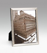 Modern silverplate design holds a favorite photo vertically or horizontally. Polished cedar wood back Made in Italy