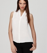 As easy an a tee, but infinitely more chic, this sleeveless VINCE CAMUTO blouse slips into pencil skirts just as well as boyfriend jeans. The styling possibilities are endless.