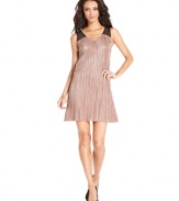 A sheer lace back adds eye-catching appeal to this pleated BCBGeneration dress -- perfect for hot soiree style!