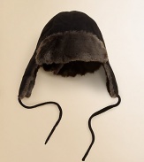 Faux fur trim and earflaps add superior warmth and style to this surprisingly soft hat. Faux fur trimSelf-tie beneath chinPolyester/spandexHand washImported