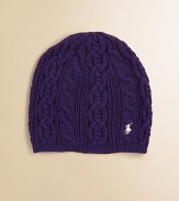 A cable-knit hat is rendered in a cool slouchy silhouette.Solid rubbed brimCottonMachine washImported