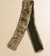 A classic Aran pattern and sumptuous faux fur lend a luxurious heritage look to a warm wool-cashmere scarf.Faux fur and cable-knit underside62L X 7 W70% wool/30% cashmereHand washImported